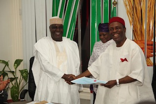 Former Vice President Atiku Abubakar collects his certificate