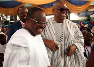 Governor of Oyo state, Abiola Ajumobi (left) and his predecessor Christopher Alao Akala share a joke during the church ceremony