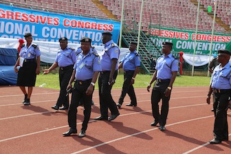 Security Conscious: Policemen keep an eye on their environment