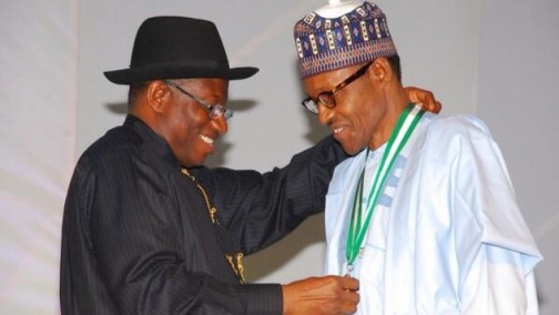 Jonathan and Buhari: handing over the medal of victory