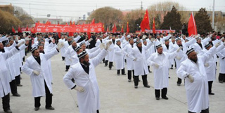 China forces imams of eastern Muslim majority district of Xinjiang to dance in the street, and swear to an oath that they will not teach religion to children as well as telling them that prayer is harmful to the