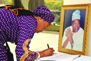 •Senator Oluremi Tinubu signing condolence register at the residence of late Okoya-Thomas in Lagos yesterday. Courtesy: Vanguard