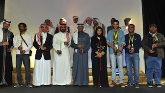 Saudi filmmakers and actors pose for a group picture with their awards on the last day of the Saudi Film Festival at Saudi culture center in Dammam, on Feb. 24, 2015.