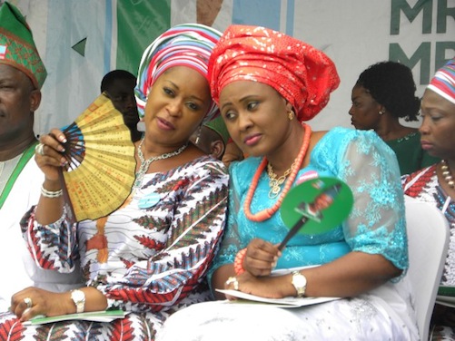 Mrs. Olufunsho Amosun, wife of Ogun State Governor in a tete-a-tete with Hajia Aisha Buhari wife of APC presidential candidate at the rally