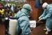 Medical staff attending to Ebola Virus victim