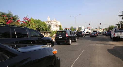 General Muhammadu Buhari's convoy respecting traffic laws