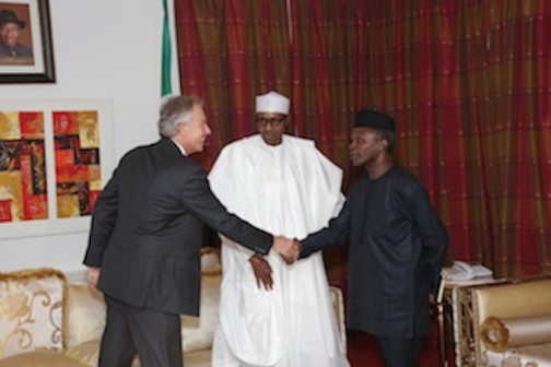 Tony Blair shake hands with vice president, Prof. Yemi Osinbajo as President Muhammadu Buhari looks on