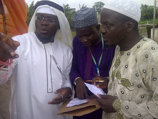 Abdulbaq Ladi-Balogun (left) with two guests at the lecture.