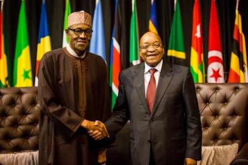 FILE PHOTO: President Muhammadu Buhari of Nigeria and Jacob Zuma of South Africa at the AU Summit