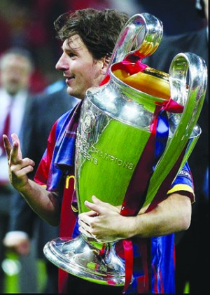 •FLASHBACK- Messi celebrates winning his third Champions League in 2011, He is bidding for a fourth in Berlin tomorrow