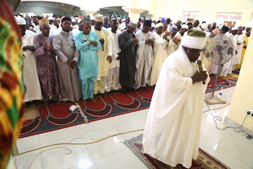 Chief Imam of Nasfat, Alhaji Abdullahi Gbade Akinbode, leading other Muslims offering prayer to the Almighty Allah to maker this yera Eid-el-Fitr