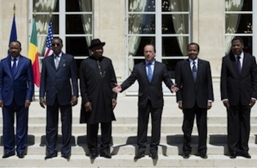 L-R: Niger’s President Mahamadou Issoufou; Chad’s President Idriss Deby Itno; Nigeria’s President Goodluck Jonathan; France’s President Francois Hollande; Cameroon’s President Paul Biya, and Benin’s President Thomas Boni Yayi pose for a photo during an African security summit to discuss the threat of Boko Haram to the regional stability, at the Elysee Palace in Paris on May 17, 2014