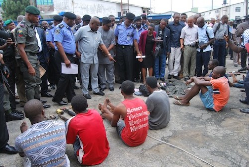 Rivers State Commissioner of Police, Mr Chris Ezike showing Governor Nyesom Wike, others recovered ammunitions