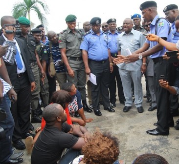 Governor Nyesom Wike of Rivers State speaking after State Police boss, Chris Ezike had given detailed explanation of the crime committed by the criminals sitting on the ground