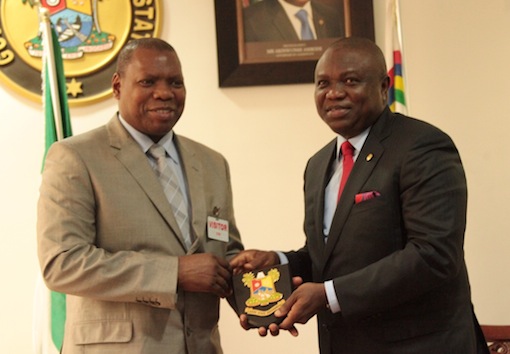 Lagos State Governor, Mr. Akinwunmi Ambode (right) presenting a State plaque to the Treasurer General, South Africa’s African National Congress (ANC), Dr. Zwelini Mkhize (left) during a courtesy visit to the Governor at the Lagos House, Ikeja, on Friday, July 24, 2015.