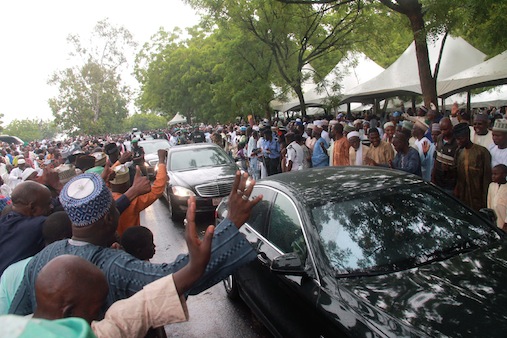 People acknowledging President Muhammadu Buhari when departing the prayer ground (1)