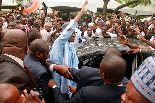 President Muhammadu acknowledging cheers from the crowds after the Eid-El-Fitr prayer, in Abuja (2)