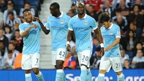 Manchester Cityís Yaya Toure, second left, celebrates scoring with teammates Raheem Sterling, left, Eliaquim Mangala and David Silva, right, during the English Premier League soccer match between West Bromwich Albion and Manchester City at the Hawthorns, West Bromwich, England, Monday, Aug. 10, 2015. (AP Photo/Rui Vieira)