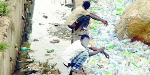 Men defecating openly in Lagos