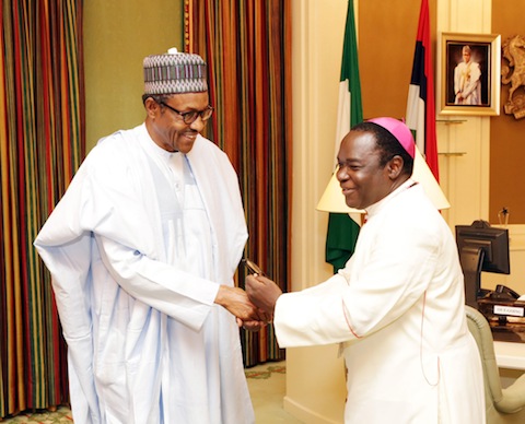 FILE PHOTO: President Muhammadu Buhari and Bishop Mathew Hassan Kukah 