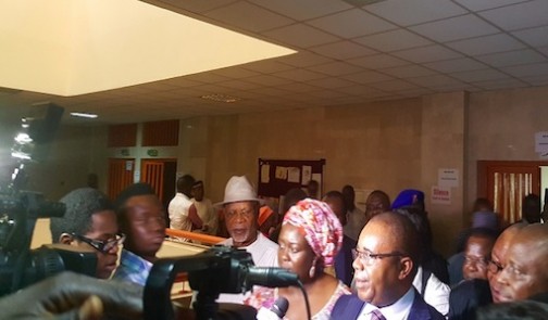Umana Okon Umana addressing newsmen after a court session