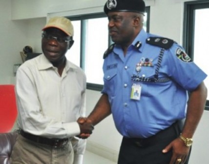 FILE PHOTO: Governor Adams Oshiomhole of Edo and Chris Ezike, Edo State Commissioner of Police