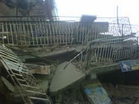 FILE PHOTO: A collapsed storey building 