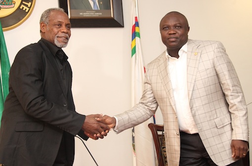 Lagos State Governor, Mr. Akinwunmi Ambode (right) shake hands with veteran Hollywood actor and film producer, Danny Glover during a courtesy visit to the governor by the cast and crew of the film 93 Days, at the Lagos House, Ikeja, on Wednesday, September 23, 2015.