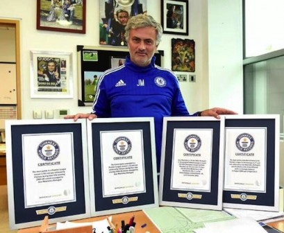 Jose Mourinho poses with his Guinness World Record certificate