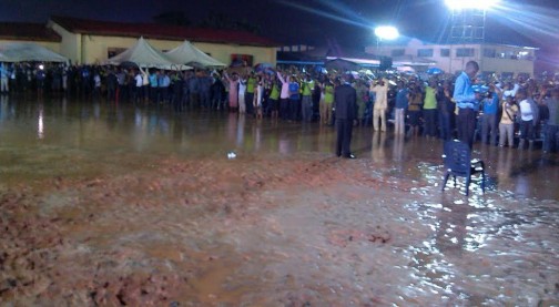 A cross section of participant in the rain at the Oshodi Crusade