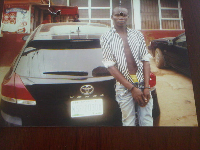 Car thief Somadina Enyiobi with the SUV he stole