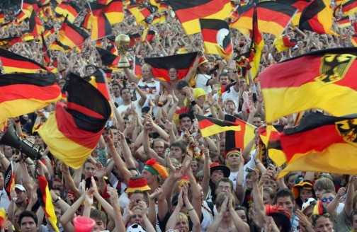 German fans at Berlin's Brandenburg Gate on July 4, 2006 watch a giant screen broadcast of the World Cup semifinal between Germany and Italy (AFP Photo/Daniel Garcia)