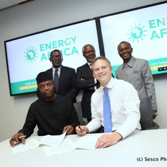 Vice President of Nigeria, Prof Yemi Osinbajo and UK Minister of State for International Development, Grant Shapps sign the solar energy pact