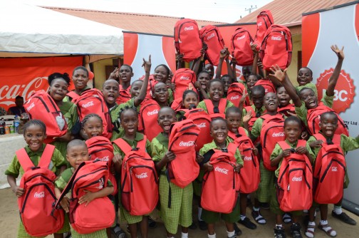 Corporate Social Responsibility: Pupils jubilating after receiving educational support kits from Nigerian Bottling Company through the company's Back to School initiative.