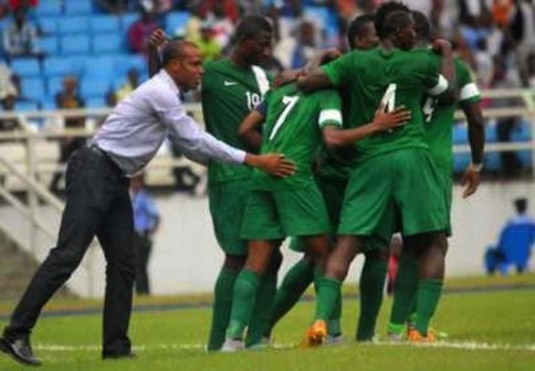 FILE PHOTO: Super Eagles players celebrate with coach Sunday Oliseh