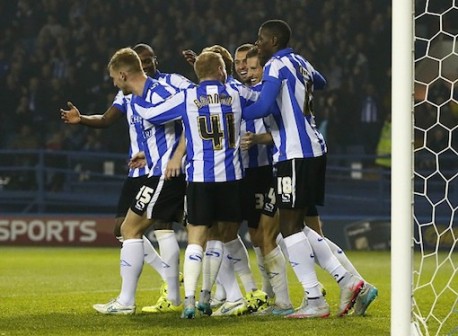 Sheffield Wednesday players after scoring against Arsenal
