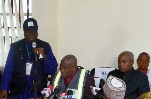 INEC officials announcing results for Kogi polls