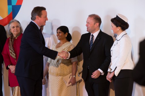 British Prime Minister David Cameron being welcomed by Prime Minister of Malta Dr Joseph Muscat and his wife as he arrives to participate at the Opening of the 2015 Commonwealth Heads of Government Meeting in Malta on 27th Nov 2015