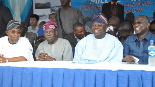 Lagos State Governor, Mr. Akinwunmi Ambode (2nd left), cutting the tape to commission the Mile 12-Ikorodu BRT Extension and launching of new Bus Rapid Transit, on Thursday, November 12, 2015. With him are Osun State Governor, Ogbeni Rauf Aregbesola (right); APC National Leader, Asiwaju Bola Tinubu (2nd right) and Commissioner for Transportation, Dr. Dayo Mobereola (left)