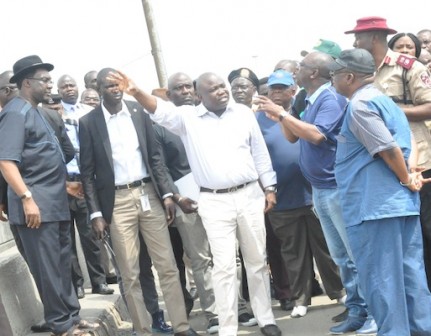 Lagos State Governor, Mr. Akinwunmi Ambode (2nd left) discussing with Commissioner for Transportation, Dr. Dayo Mobereola (2nd right) during his inspection at Liverpool Road, Apapa, on Tuesday, November 10, 2015. With them are Commissioner for Works & Infrastructure, Engr. Ganiyu Johnson (right), Commissioner for the Environment Dr. Babatunde Adejare (3rd right) and Commissioner for Information & Strategy, Mr. Steve Ayorinde (left)