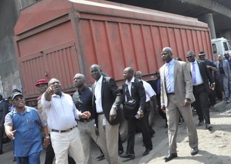 Lagos State Governor, Mr. Akinwunmi Ambode (2nd left), pointing at a place of interest, Commissioner for Works & Infrastructure, Engr. Ganiyu Johnson (left), during his inspection of Liverpool Road, Apapa, on Tuesday, November 10, 2015
