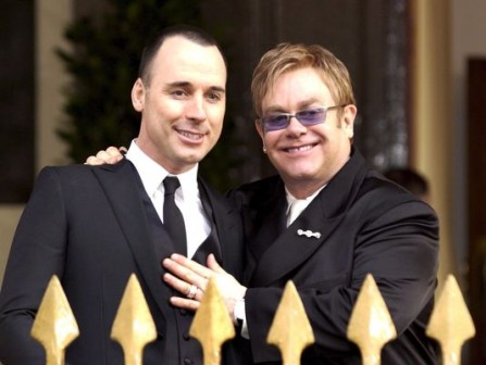 L-R: David Furnish and his wife, Elton John
