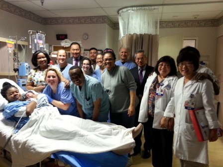 Dr. Ada Igonoh and her baby girl accompanied by friends and medical team