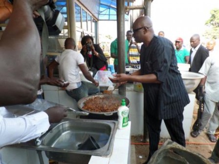 Fayose caught buying goat meat in a market at Ekiti