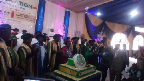 Chief Olusegun Obasanjo, Gov. Ibikunle Amosun, Revd. Tola Oyediran, Awolowo's daughter, joining the management in cutting of birthday cake of TASUED, marking the 10th anniversary celebration of the institution. Photo: Abiodun Onafuye 