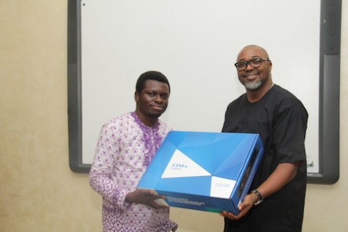 Arukaino Umukoro of The Punch gets a DStv Explora from Multichoice MD, John Ugbe