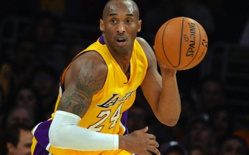 Kobe Bryant of the Los Angeles Lakers drives against the Memphis Grizzlies during their NBA game 33 at the Staples Center in Los Angeles, California on January 2, 2014.  The Grizzlies went on to win 109-106.                       AFP PHOTO/MARK RALSTONMARK RALSTON/AFP/Getty Images