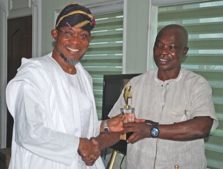 Governor State of Osun Ogbeni Rauf Aregbesola (left) Receiving the PANAFEST Award of Out Standing Leadership from Consulate General of Ghana in Lagos, Mr Kwabena Appiah, in his office at Government Secretariat, Abere, Osogbo at the weekend