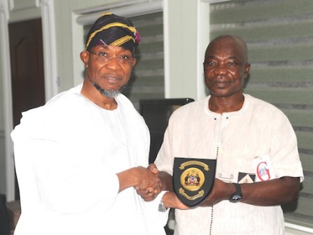 Governor State of Osun Ogbeni Rauf Aregbesola (left) Presenting a gift to Consulate General of Ghana in Lagos, Mr Kwabena Appiah, after the Presentation of PANAFEST Out Standing Leadership Award to the Governor in his office at Government Secretariat, Abere,  Osogbo at the weekend