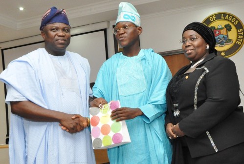 Lagos State Governor, Mr. Akinwunmi Ambode, One-Day Governor, Master Idowu Sonoiki and Deputy Governor, Dr. (Mrs.) Oluranti Adebule, during the One-Day Governor’s visit, at the EXCO Chamber, Lagos House, Ikeja, on 4 November, 2015